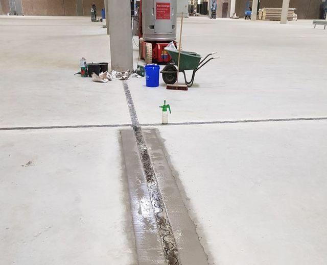 Rénovation de joints sinusoïdaux dans un hall logistique